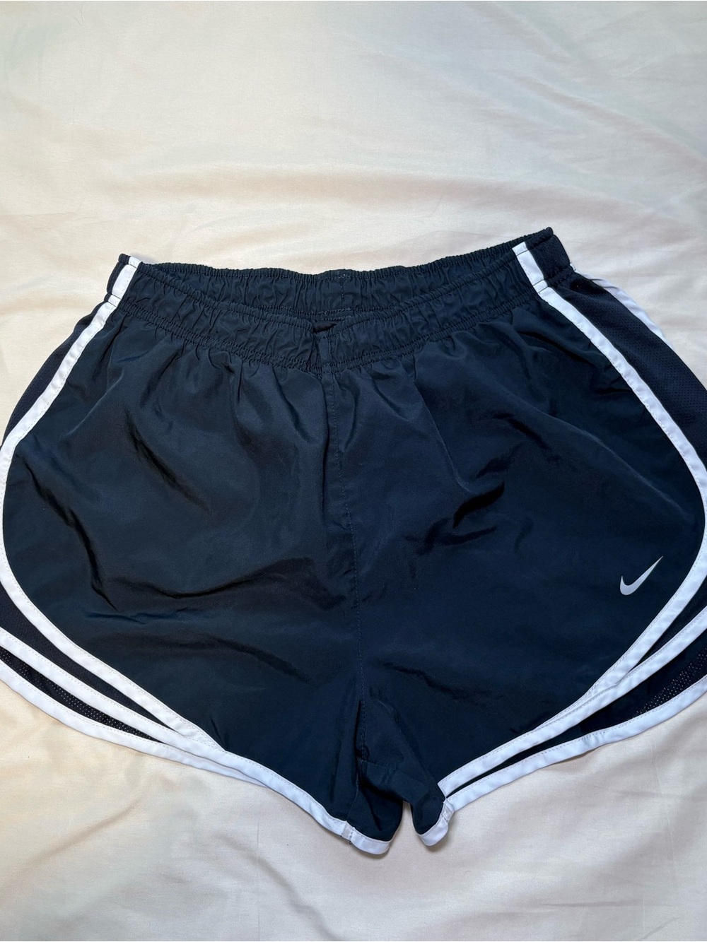 Nike Women's Black Athletic Shorts with White Piping and Swoosh
